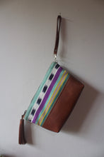 Load image into Gallery viewer, All bags come with a leather tassel and detachable wristlet  (Pictured: Panchoy Bag made with "Acatenango Blue" fabric and "Chocolate" leather)